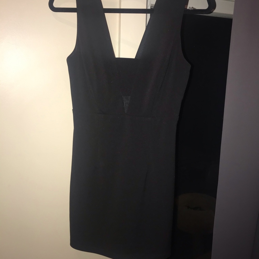 Black mini dress with cute chest cut out